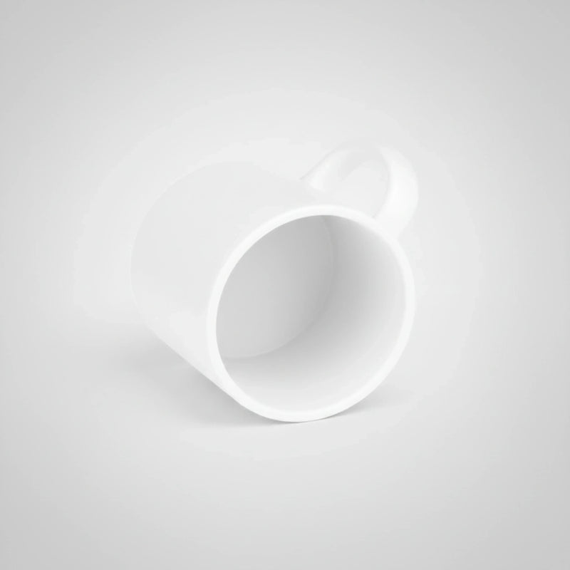 White ceramic coffee mug on a light gray background. Just Groom Me – Trimsalon Alphen aan den Rijn | Professional dog grooming & personalized pet apparel.