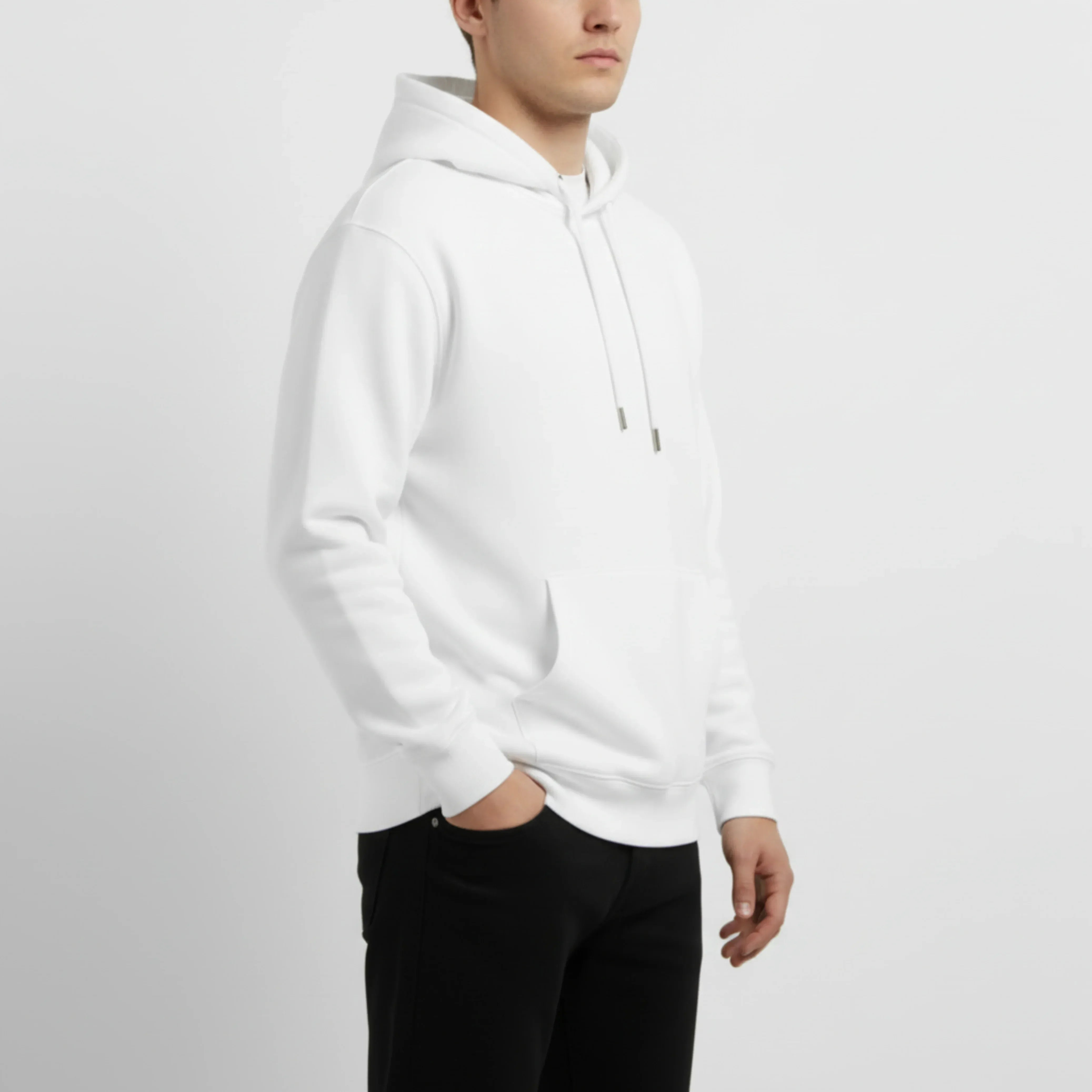 Person wearing a white hoodie on a plain background. Just Groom Me – Trimsalon Alphen aan den Rijn | Professional dog grooming & personalized pet apparel.